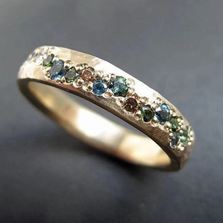 Elegant women's yellow gold zircon & opal ring with a minimalist starry sky design. Perfect celestial fashion jewelry.