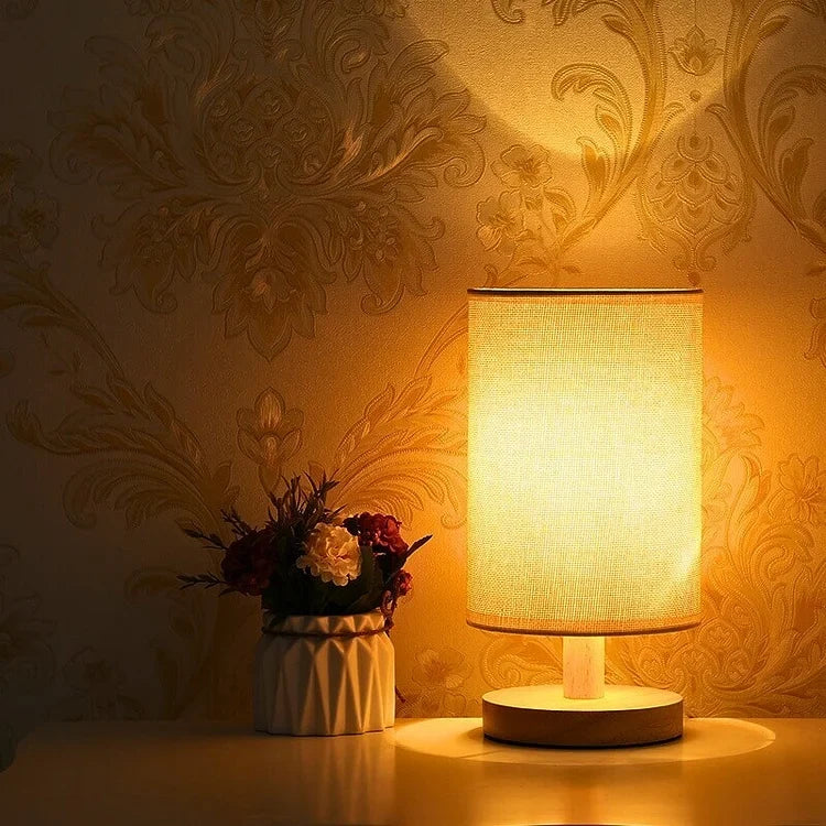 Minimalist wood table lamp by Nvroome. Dimmable LED for bedroom or living room. Natural organic decor.