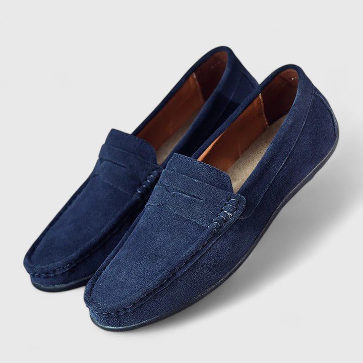 Front view of classic men's slip-on comfort loafers, essential everyday footwear.