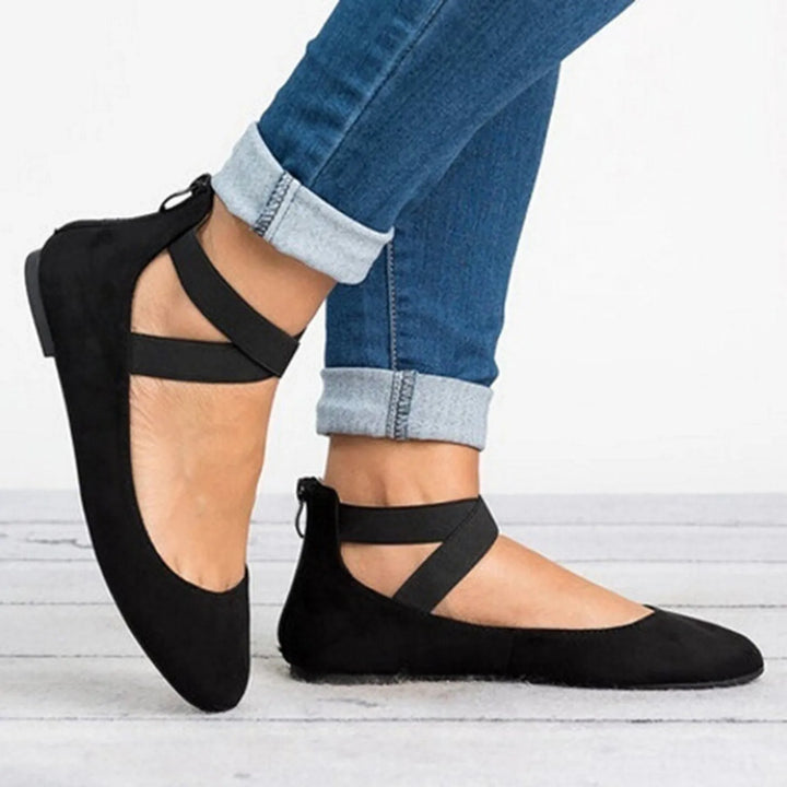 Close-up of women's comfortable cross-strap ballet flats, showcasing the elegant and practical design.