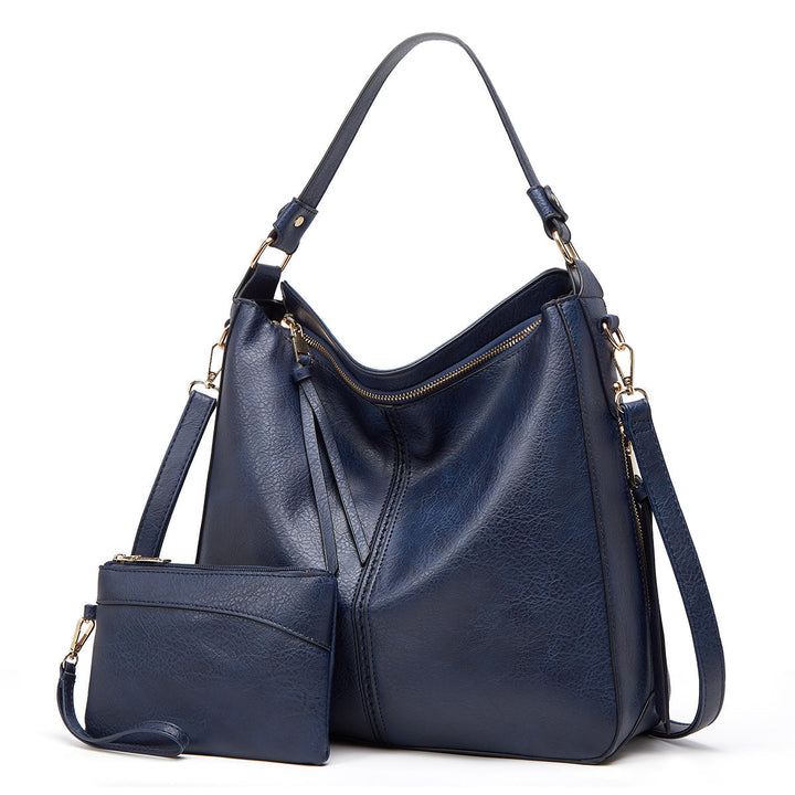 Spacious women's elegant leather shoulder bag, a luxury everyday accessory.