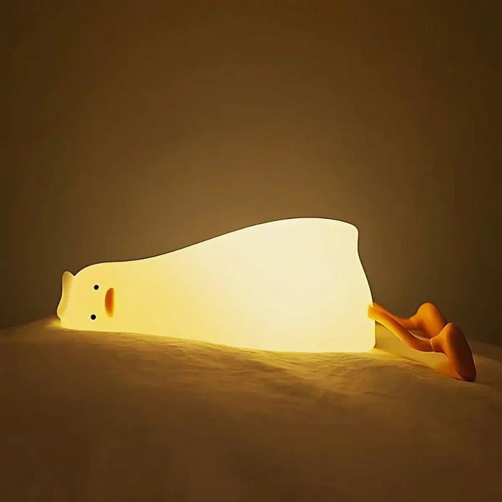 Cute animal silicone nightlight for nursery decor; LED, dimmable, soft light for bedside.
