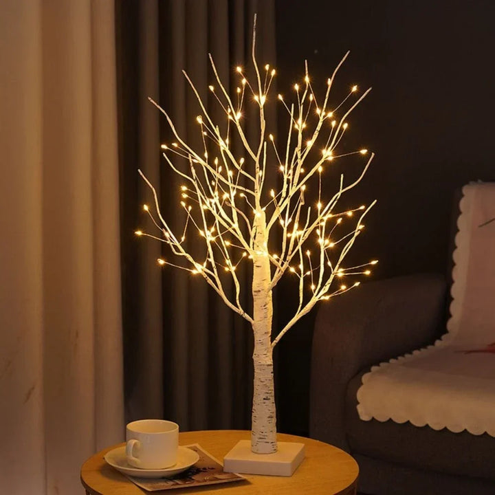 Elegant LED bonsai style birch tree lamp, providing a warm white glow for modern decorative lighting.