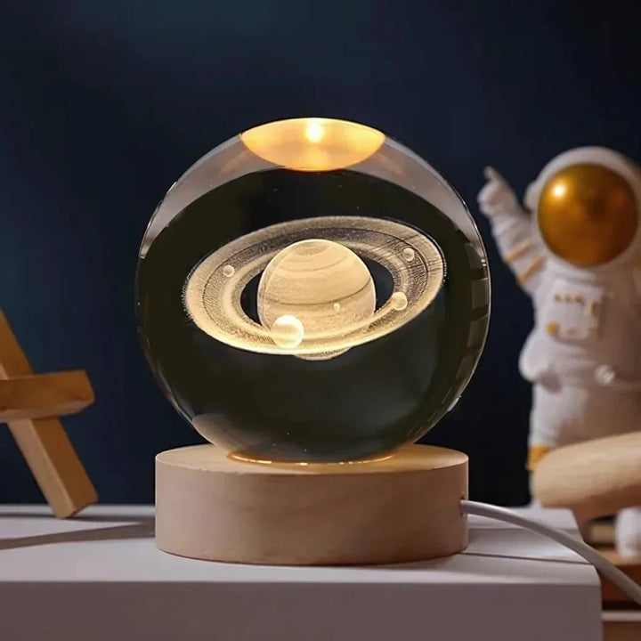 Vibrant 3D galaxy crystal ball LED light with an elegant wooden stand. A captivating universe night lamp.