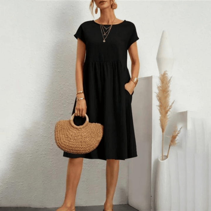 Sleeveless casual women's dress featuring tummy control for a smooth, flattering look.