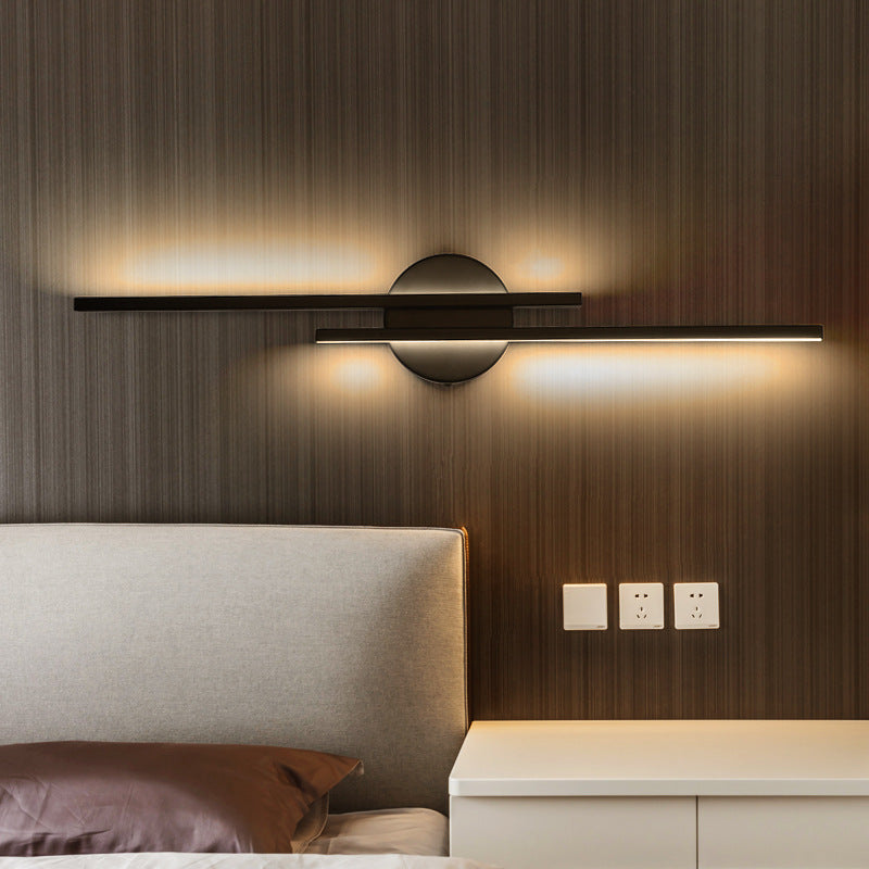 Contemporary LED wall fixture offering soft, dimmable ambient light. Perfect for modern interior decor.