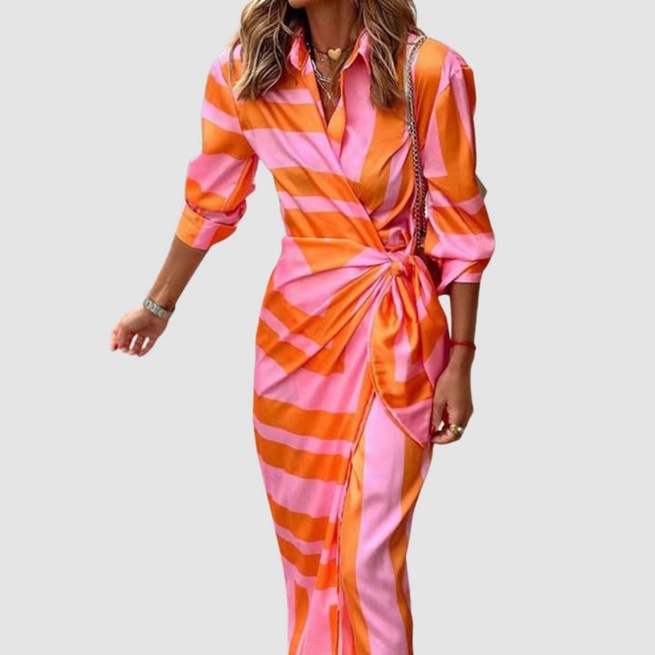 Women's elegant striped midi dress, versatile for casual daywear or stylish office attire. Comfortable spring/summer fashion.