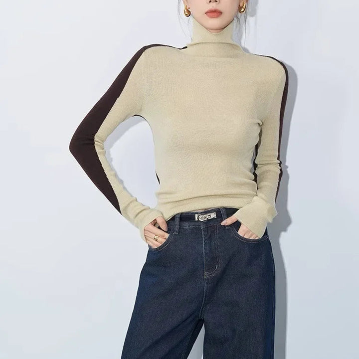 Women's elegant mock neck sweater with stylish contrast long sleeves. Perfect for casual chic winter fashion.