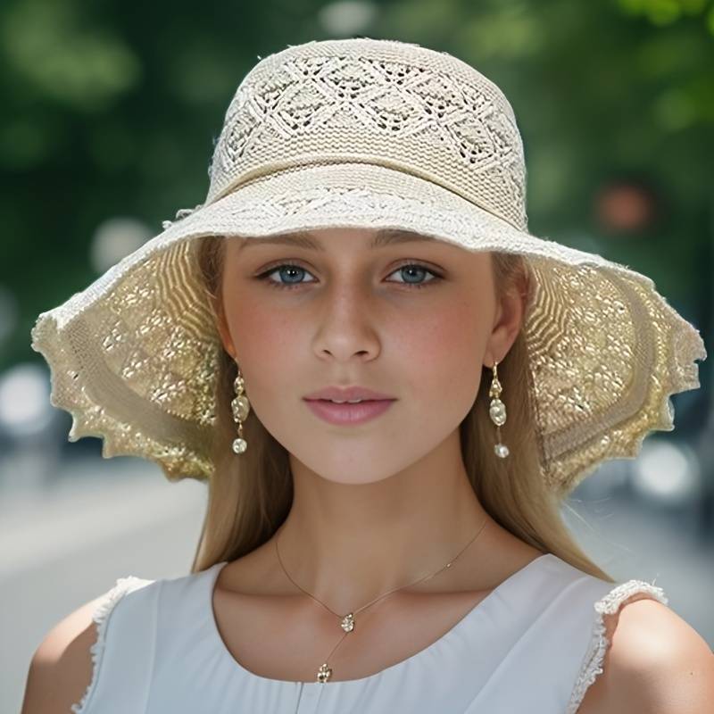 Foldable wide-brim women's sun hat, ideal for travel. Provides excellent UV protection & elegant summer style.