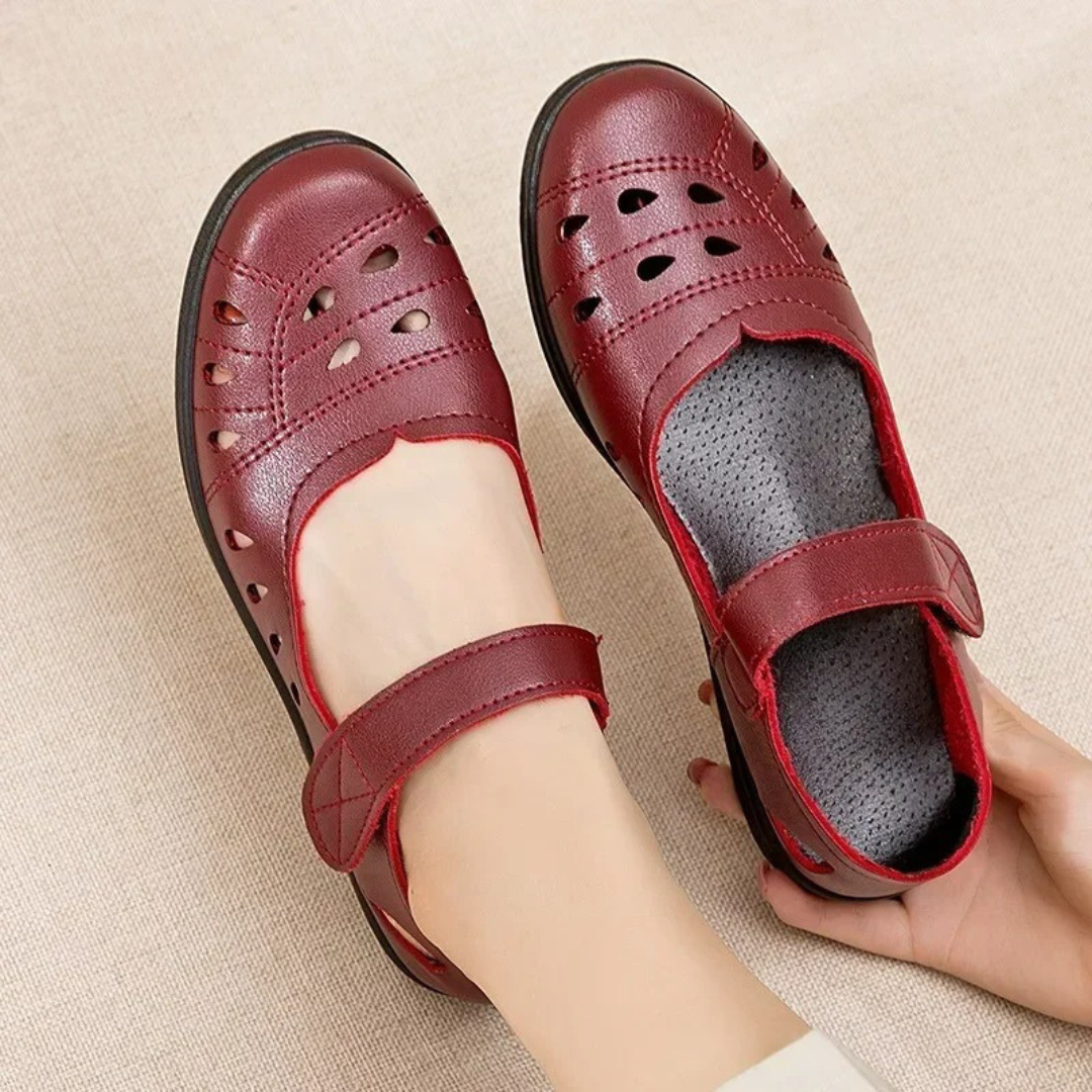 Supportive women's orthopedic shoes with adjustable straps, ideal for foot health and comfortable walking.