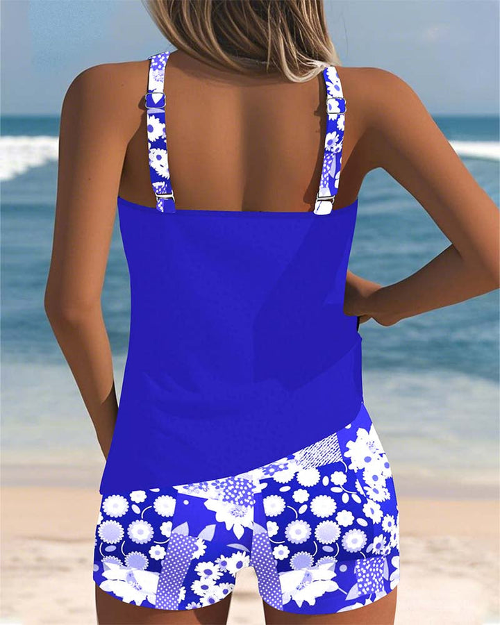 Complete women's printed two-piece swimsuit set, perfect for stylish summer beachwear.