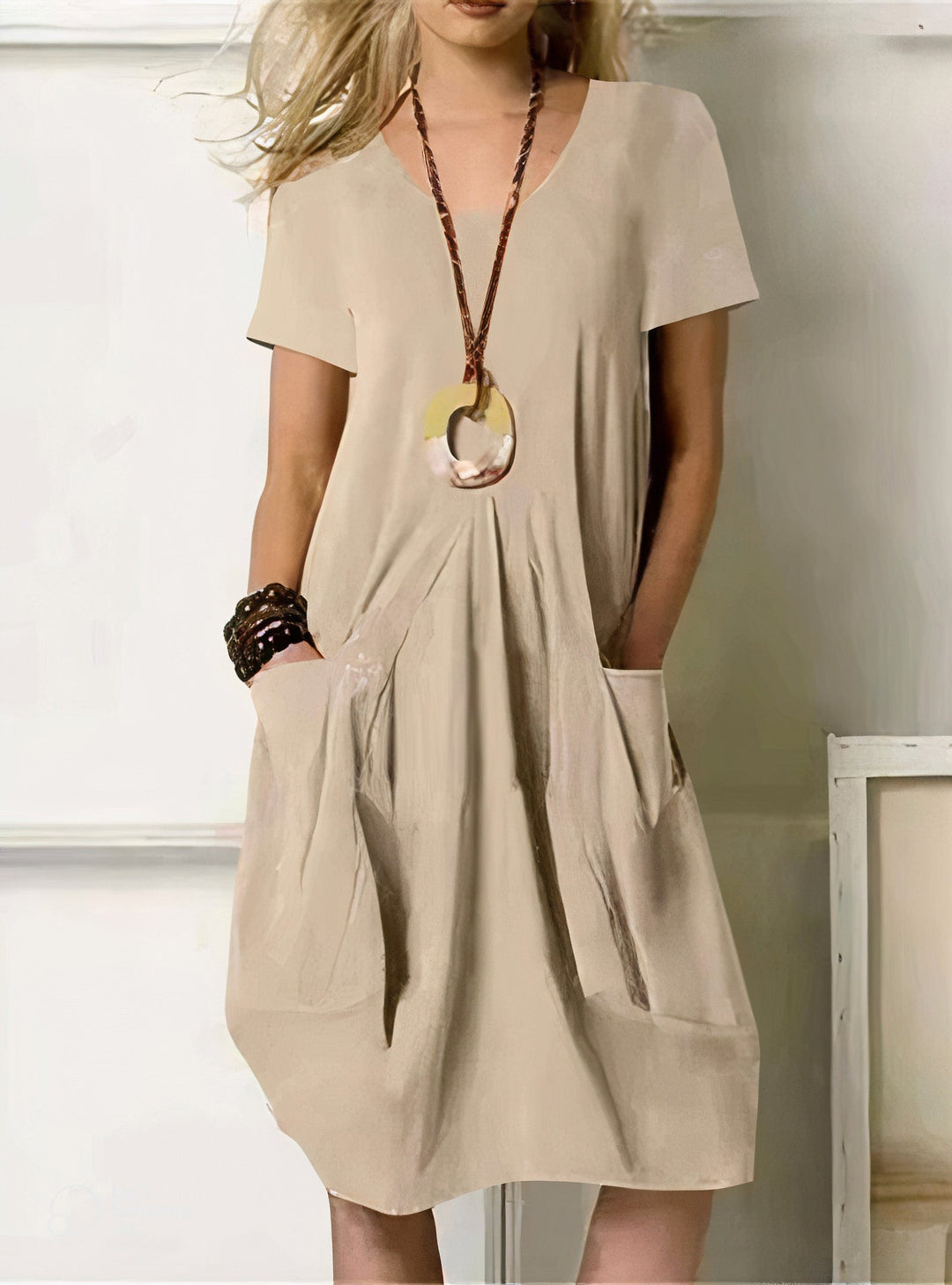 Chic orange women's casual dress. Relaxed, flattering fit ideal for comfortable summer style and everyday wear.