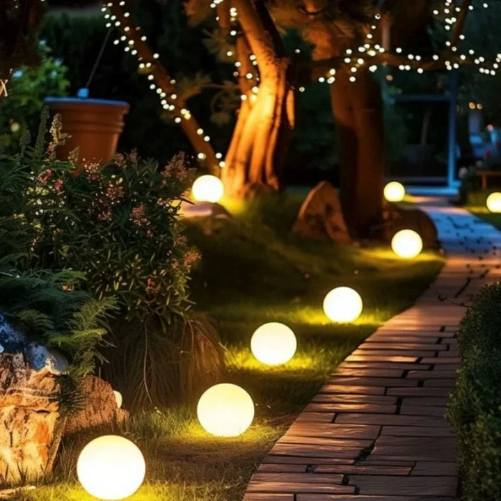 16-color RGB spherical garden light with remote control. Weatherproof LED for charming outdoor mood lighting.