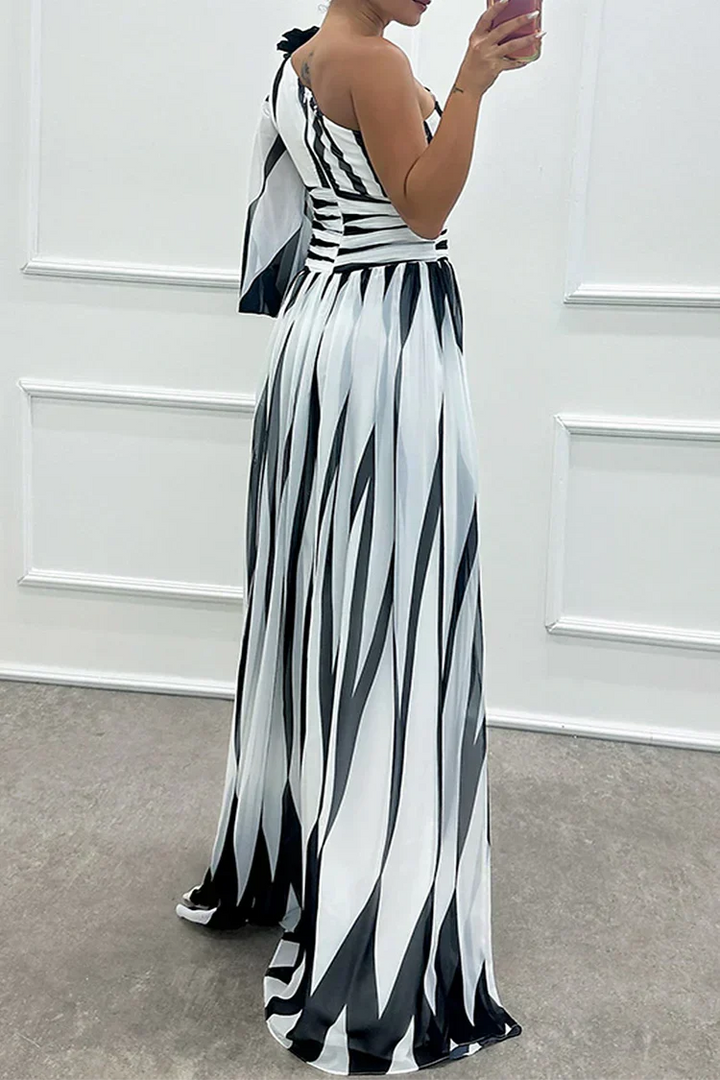 Flowing elegant women's striped maxi dress with a sophisticated one-shoulder design.