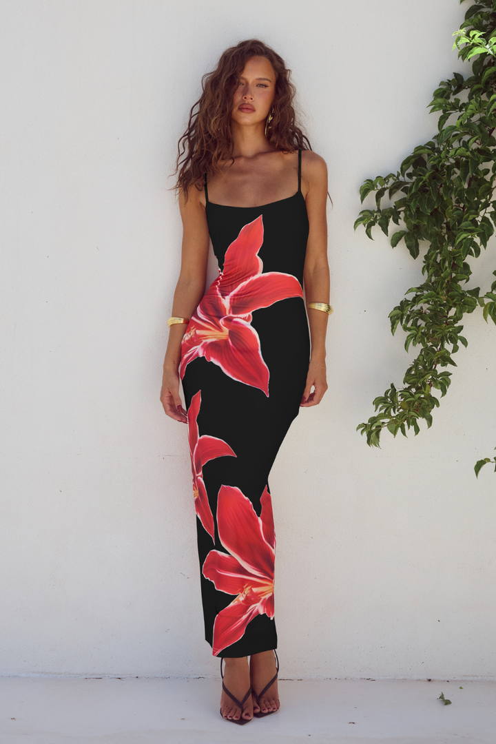 Women's elegant floral print bodycon midi dress, perfect for summer parties.