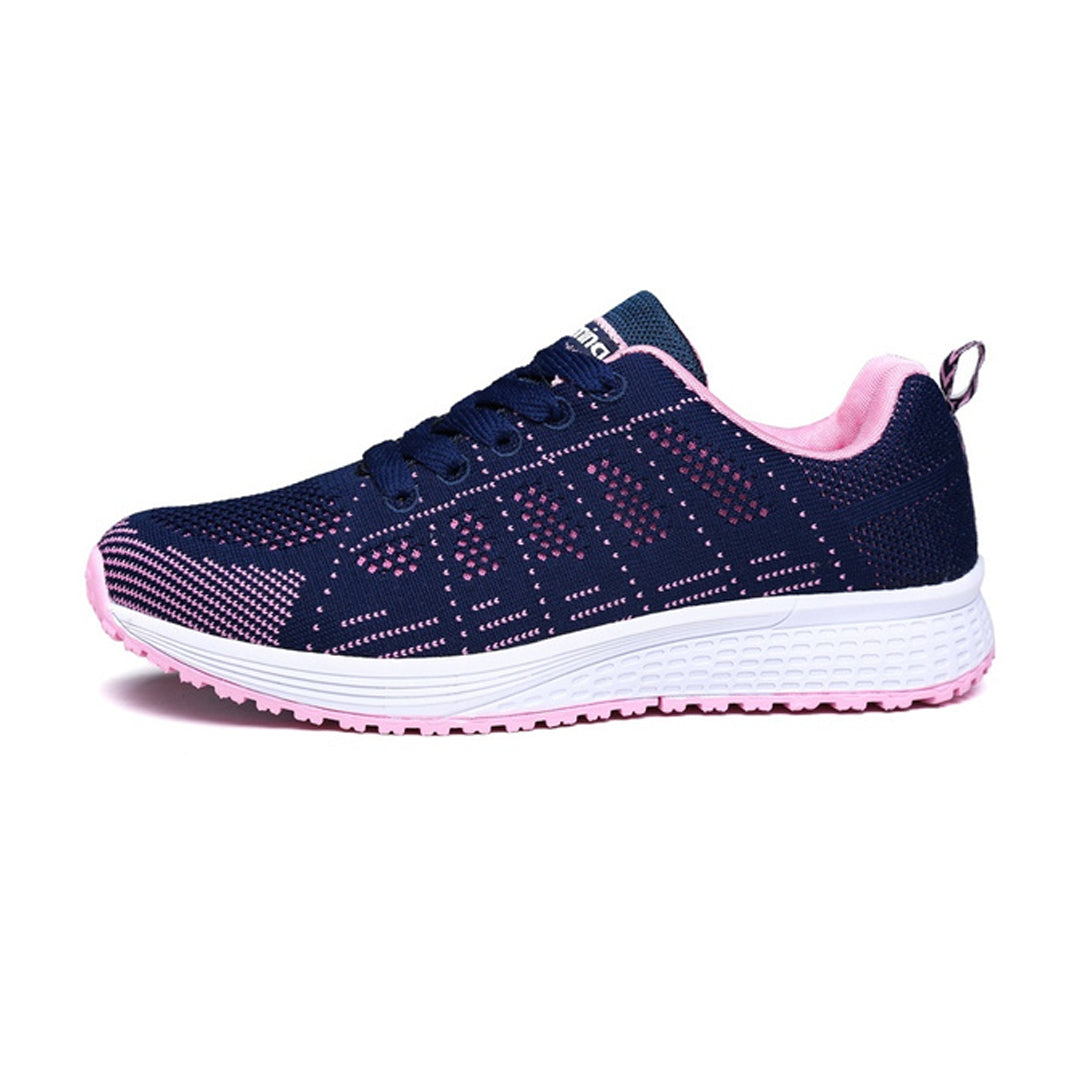 Stylish women's comfort sneakers with ergonomic design, offering supportive cushioning for versatile everyday wear.