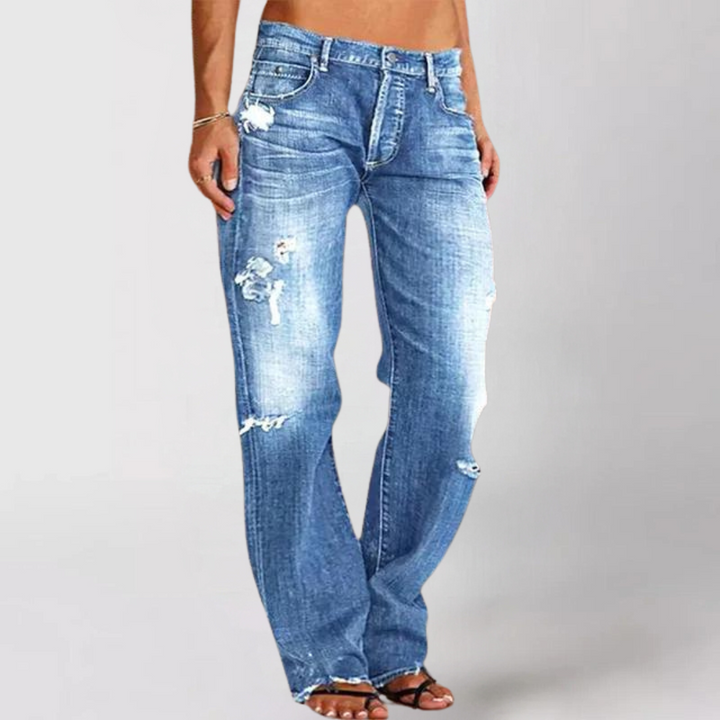 Women's loose wide-leg denim jeans. Comfortable, low-rise, casual, and fashionable for effortless everyday style.