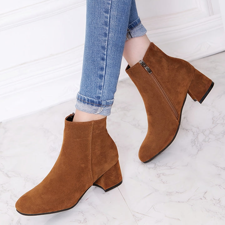 Women's elegant Chelsea ankle boots. Stylish, comfortable block heel for sophisticated fall & winter women's fashion.