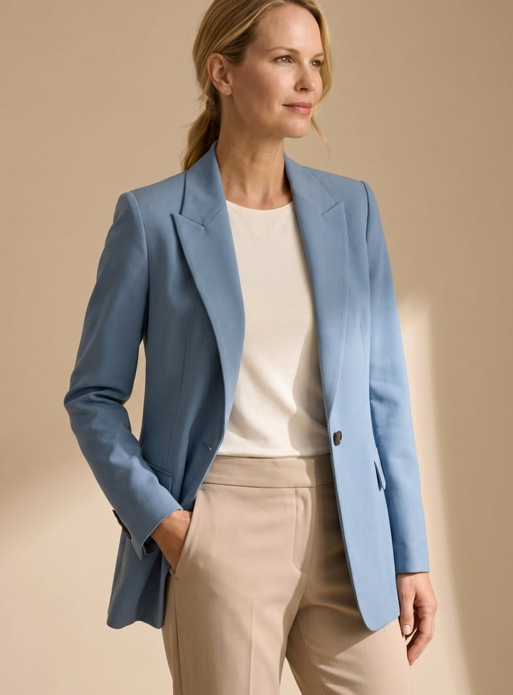 Women's elegant suit: a chic blazer and flared trousers two-piece set for sophisticated office & formal attire.