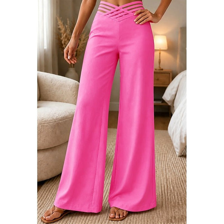 Flowy women's high-waist wide-leg pants, ideal for comfortable and elegant summer or spring fashion.