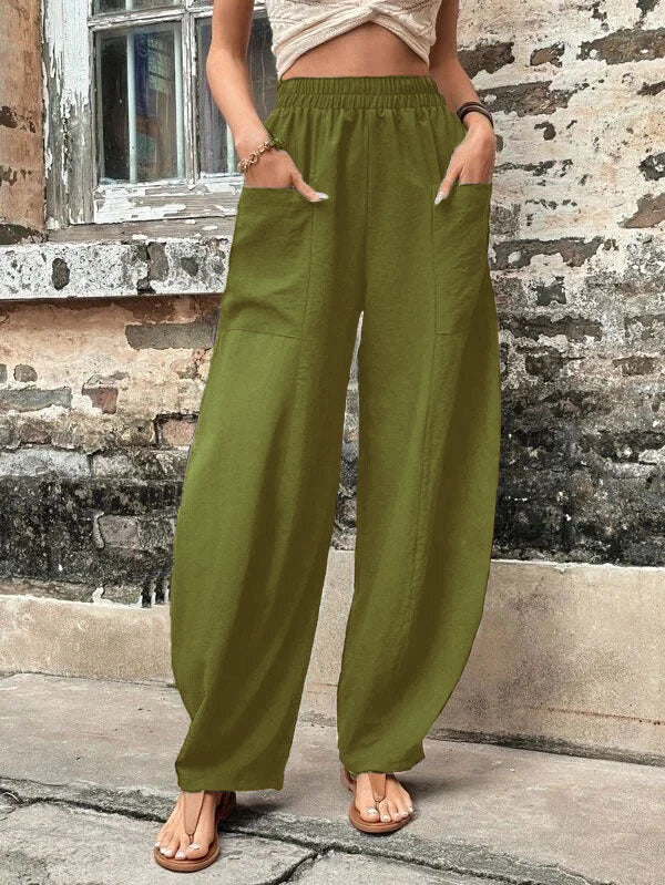 Women's fashionable wide-leg palazzo trousers with pockets, showcasing a flowing silhouette for elegant style.