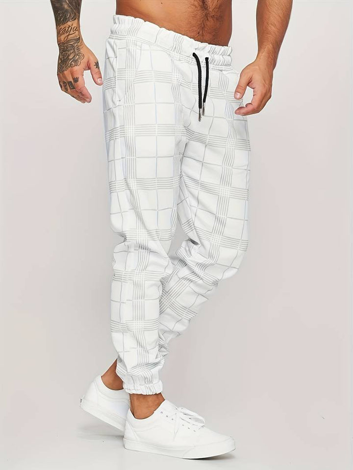 Stylish men's checked joggers, ideal for everyday comfort, sporty fashion, and a modern casual look.