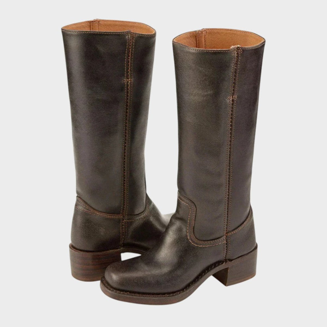 Stylish women's Western knee-high boots with a comfortable block heel for a fashionable cowgirl look.