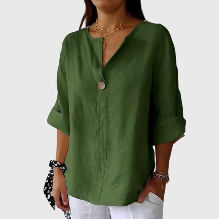 Classic women's V-neck blouse with elegant single button detail and long sleeves, a versatile and chic shirt.