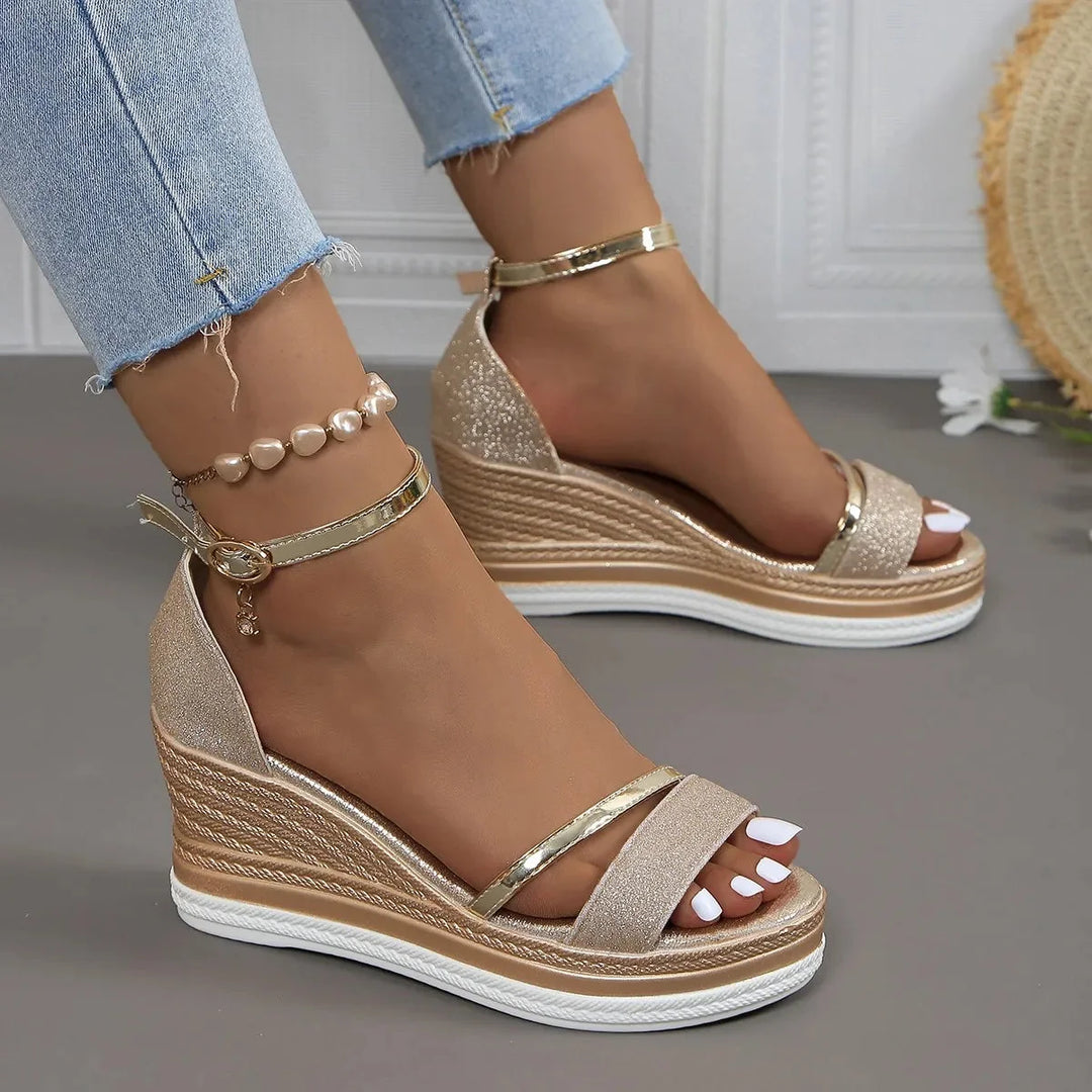 Supportive women's orthopedic wedge sandals. Features an elegant ankle strap for casual summer style.