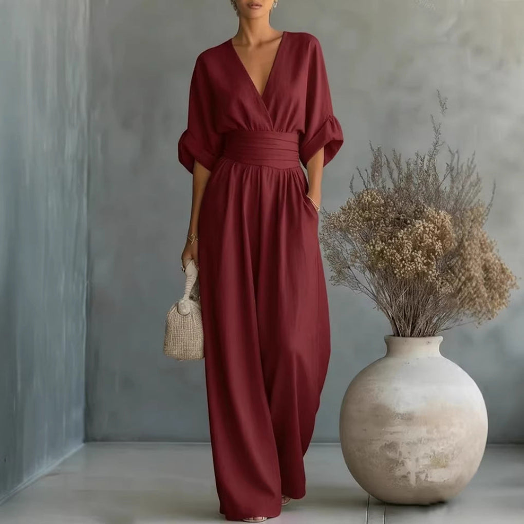 Stylish one-piece wide leg jumpsuit for women. Short sleeve, V-neck, & relaxed fit, great for travel.