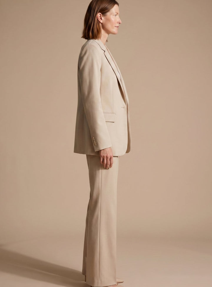 Sophisticated women's flared trousers & elegant blazer two-piece set, ideal for professional office wear.