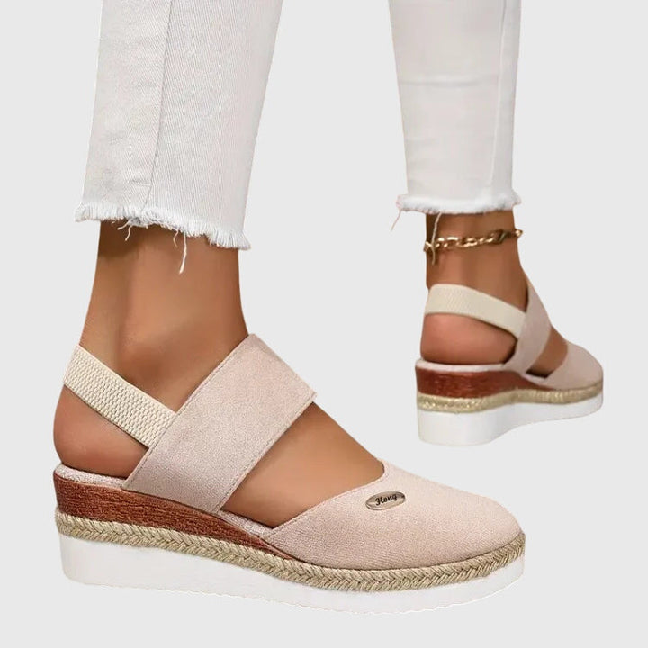 Cushioned women's orthopedic sandals, adjustable for ultimate comfort & support.