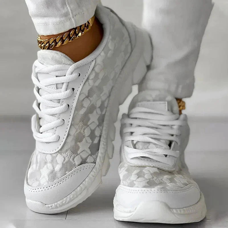 Close-up of women's comfortable orthopedic slip-on sneakers, showing texture and design.