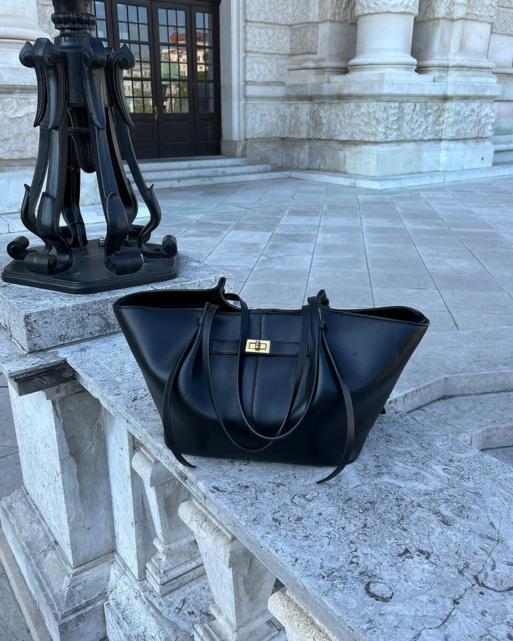 Close-up of the durable material and meticulous stitching on the Verona Structured Shoulder Bag.