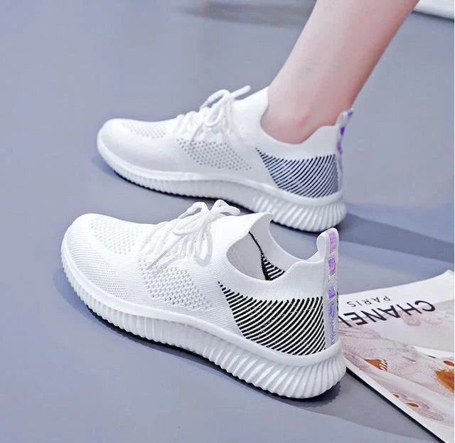 Lightweight women's orthopedic walking and running shoes with superior foot support for active lifestyles. Breathable sports sneaker.