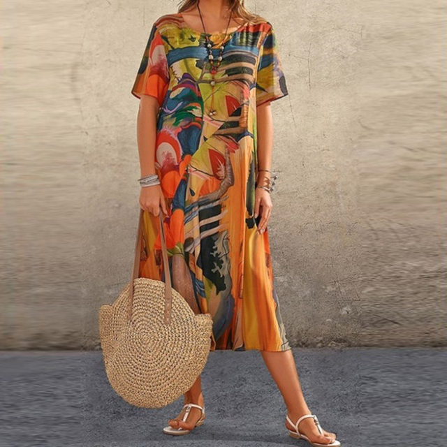 Comfortable women's relaxed fit printed midi dress, bohemian casual wear with round neck, perfect as a summer dress.