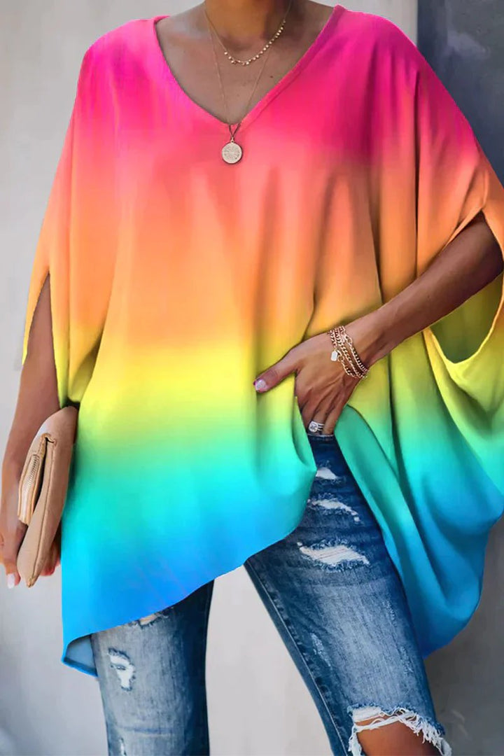 Versatile women's oversized batwing tunic with V-neck, perfect for everyday casual and comfortable style.