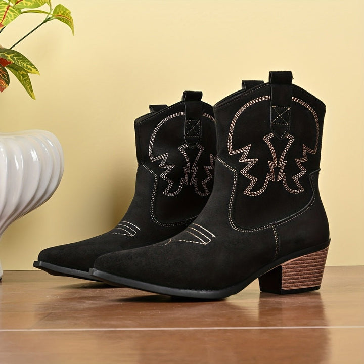 Comfortable wide-calf cowboy boots for women, stylish western footwear with a block heel and chic pointed toe.