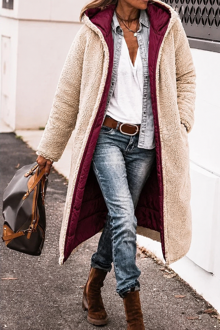 Cozy women's reversible jacket, perfect for cold weather and chic everyday fashion.