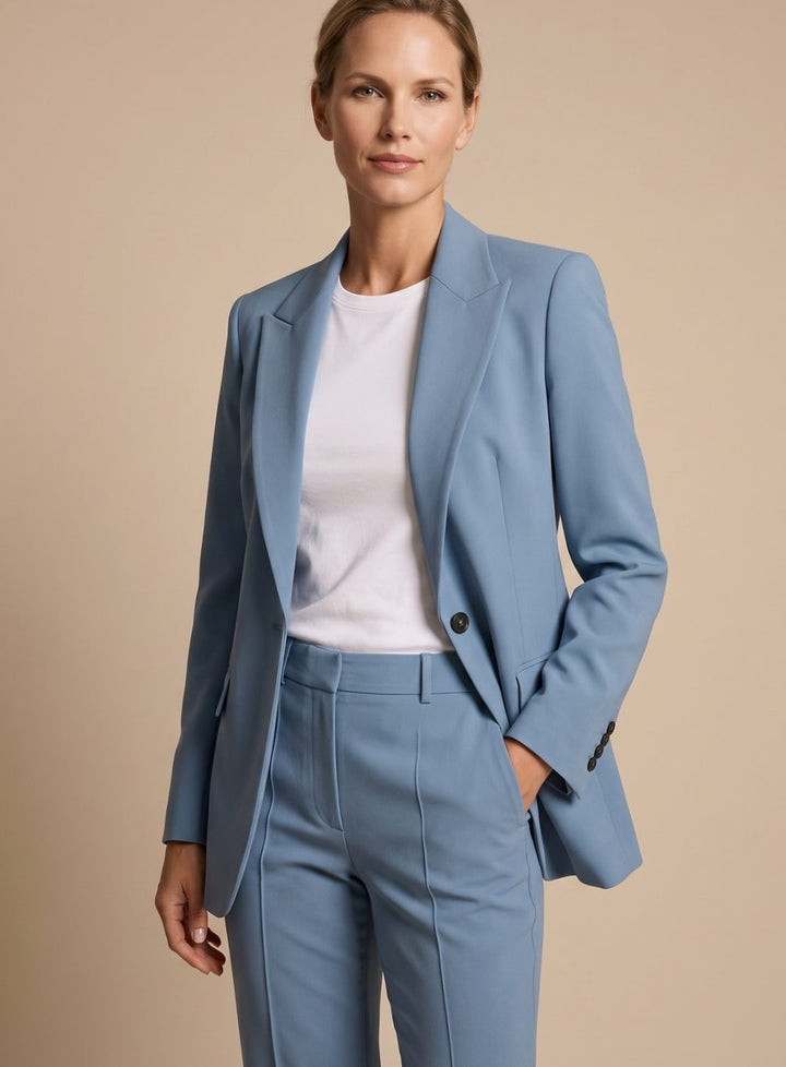 Versatile women's elegant two-piece suit with a chic blazer & flared trousers for professional and formal occasions.