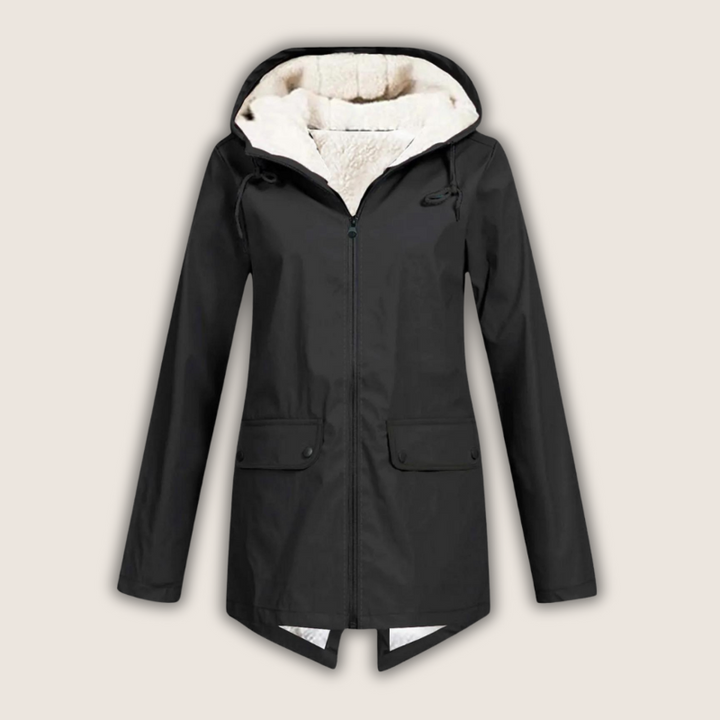 Durable women's waterproof jacket, windproof with an adjustable hood, essential outdoor gear for active women.
