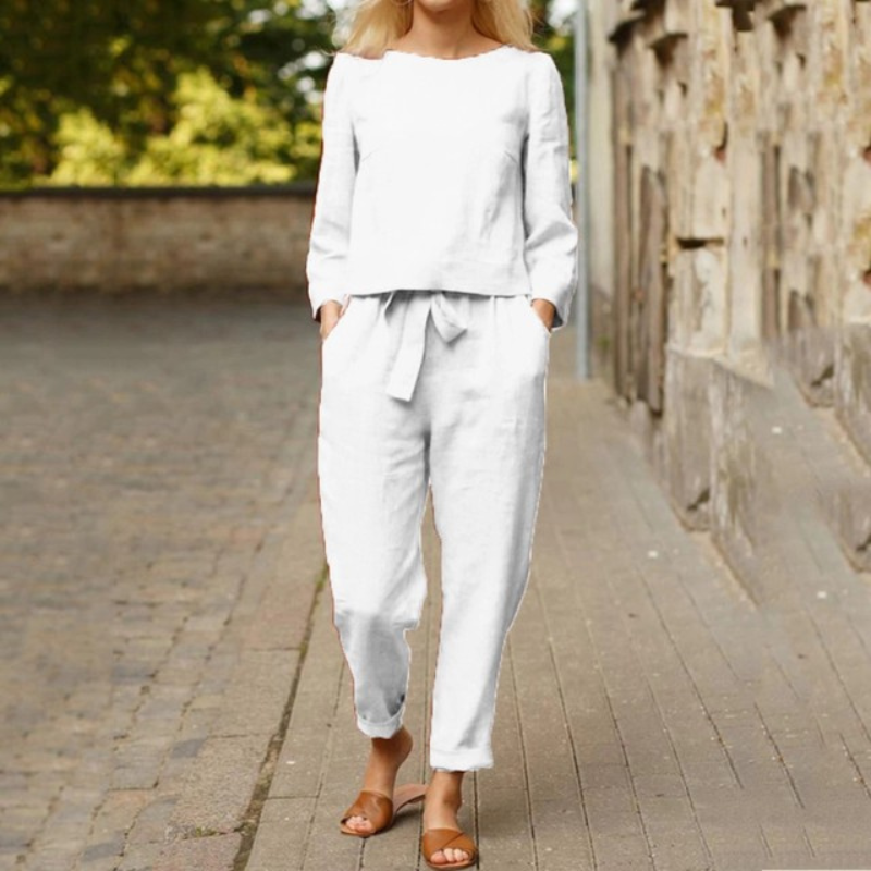 Versatile women's two-piece set: elegant long-sleeve blouse & comfortable wide-leg pants for summer travel.