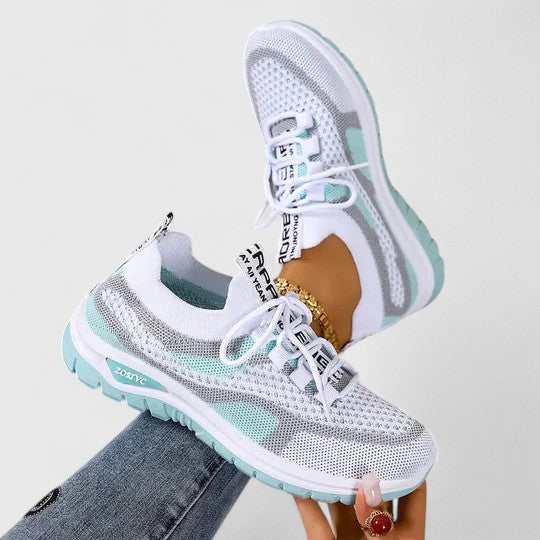 Cushioned support in lightweight women's walking sneakers, ideal for everyday comfort & activities.