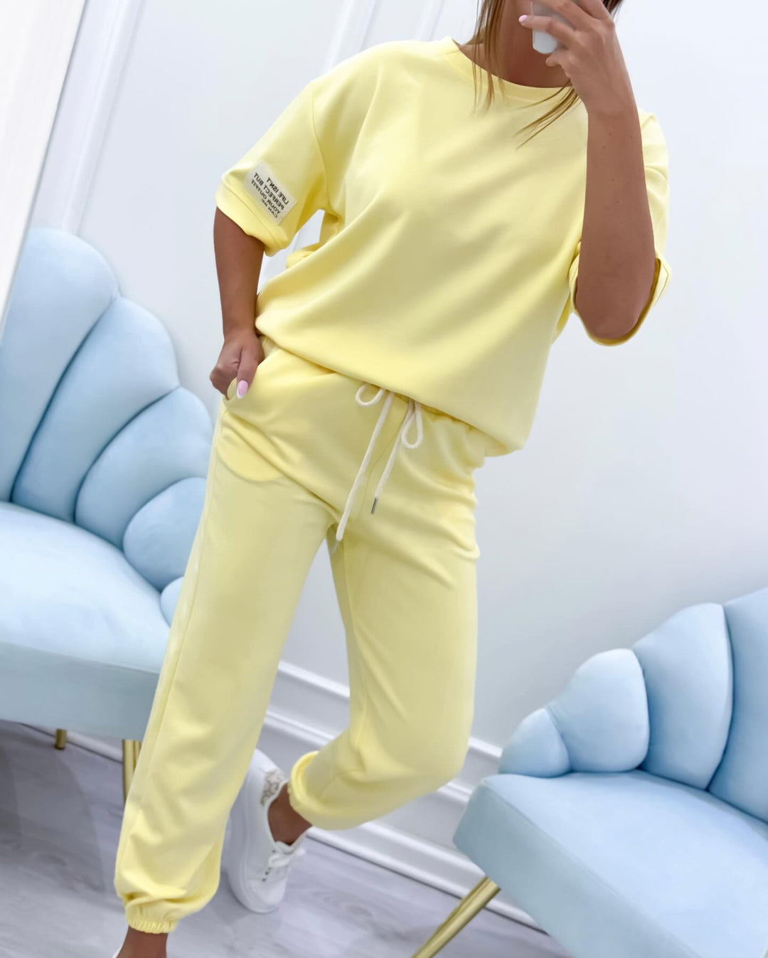 Comfortable women's short sleeve lounge set, a stylish two-piece for relaxed summer casualwear.