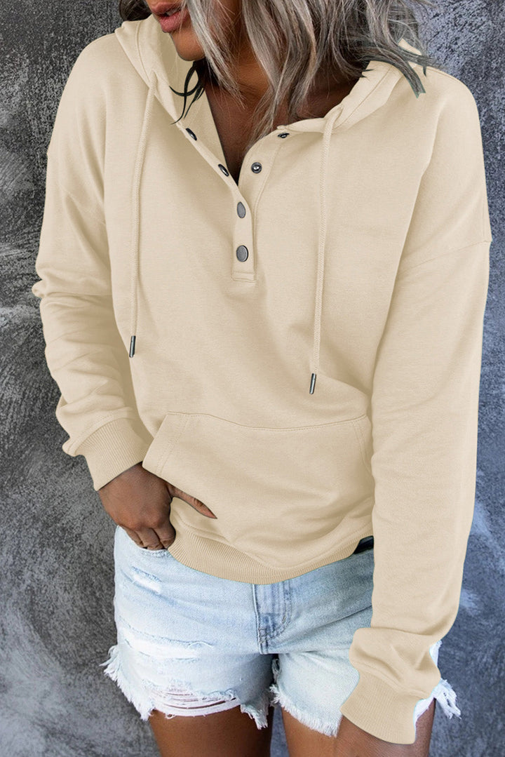 Women's cozy hooded sweater, a versatile wardrobe staple for everyday apparel & comfort.