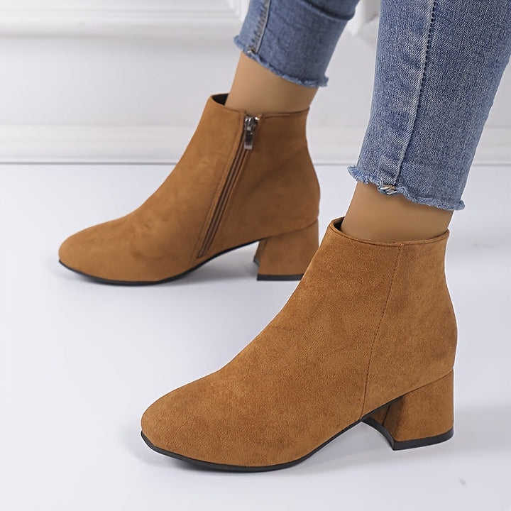 Classic women's Chelsea ankle boots. Stylish block heel & comfortable design for versatile fall & winter women's fashion.