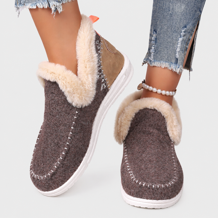 Close-up of material on women's comfort footwear, highlighting soft, durable orthopedic slippers.