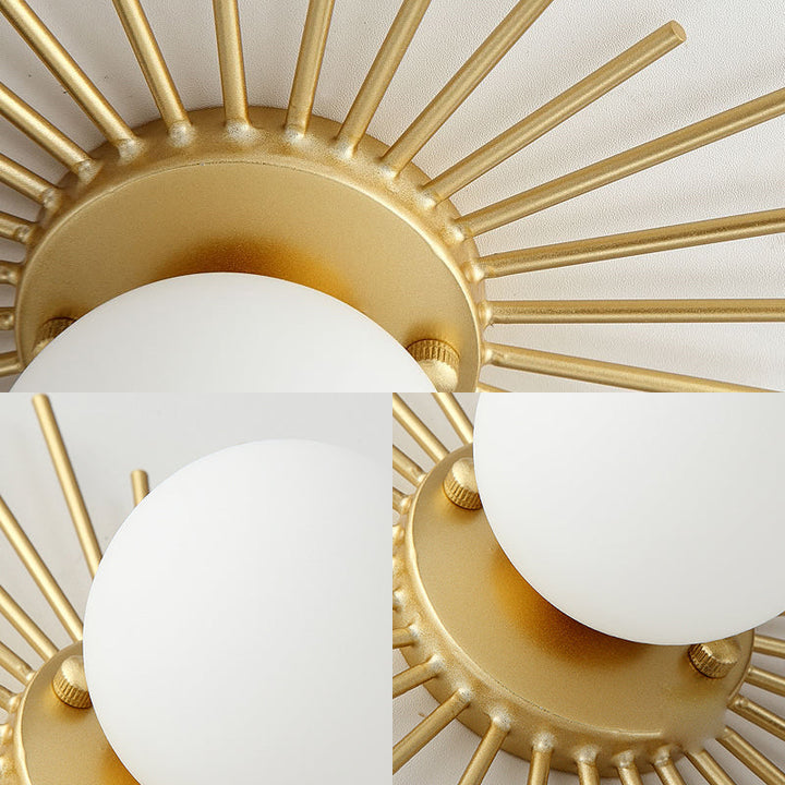 Gold spherical ceiling lamp. Frosted glass shade provides soft, diffused light for modern interiors.