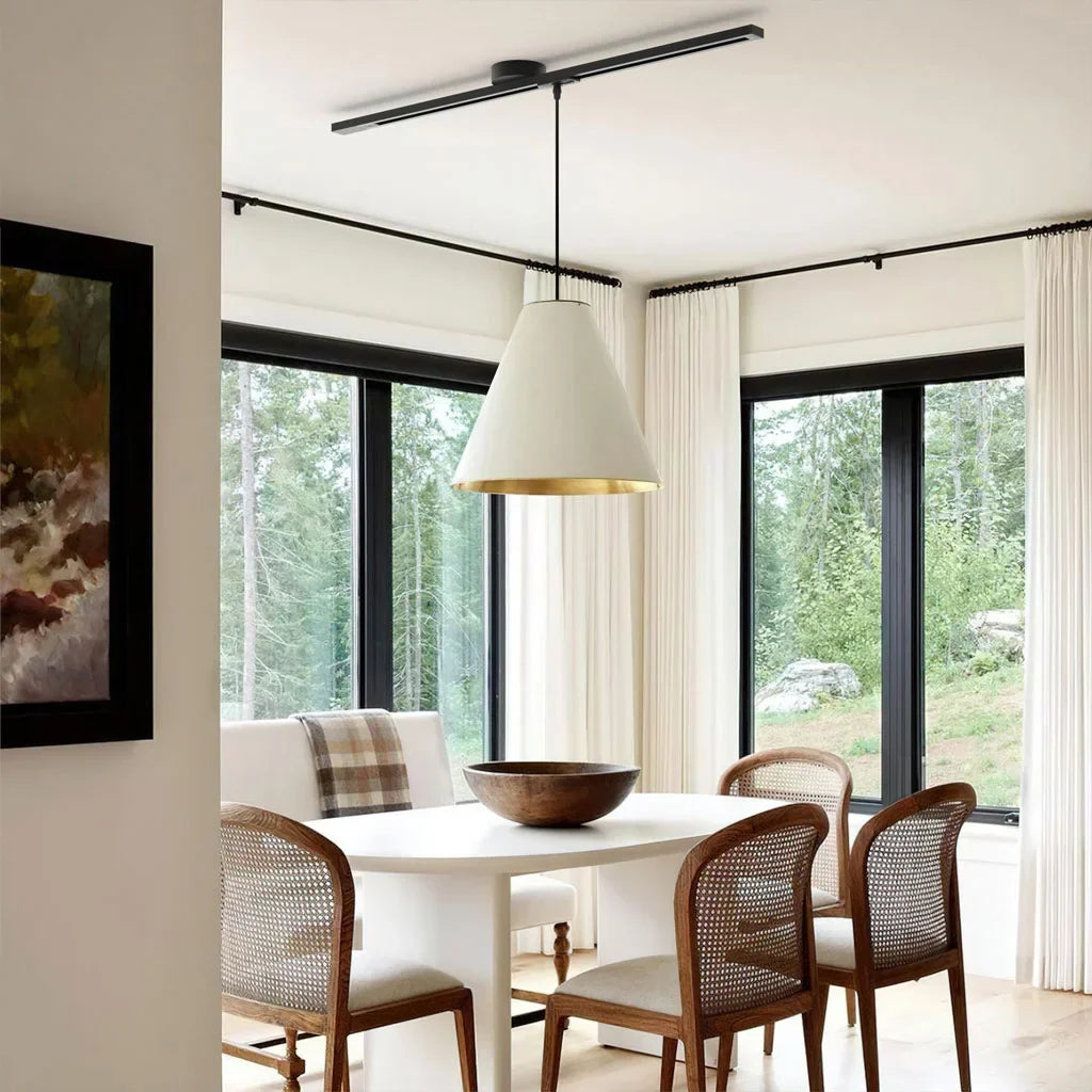 White iron pendant light rail. Adjustable & rotatable for dynamic home illumination.