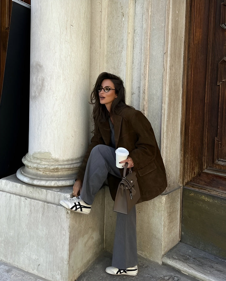 Stylish women's tailored jacket, perfect one-button blazer for polished office wear.